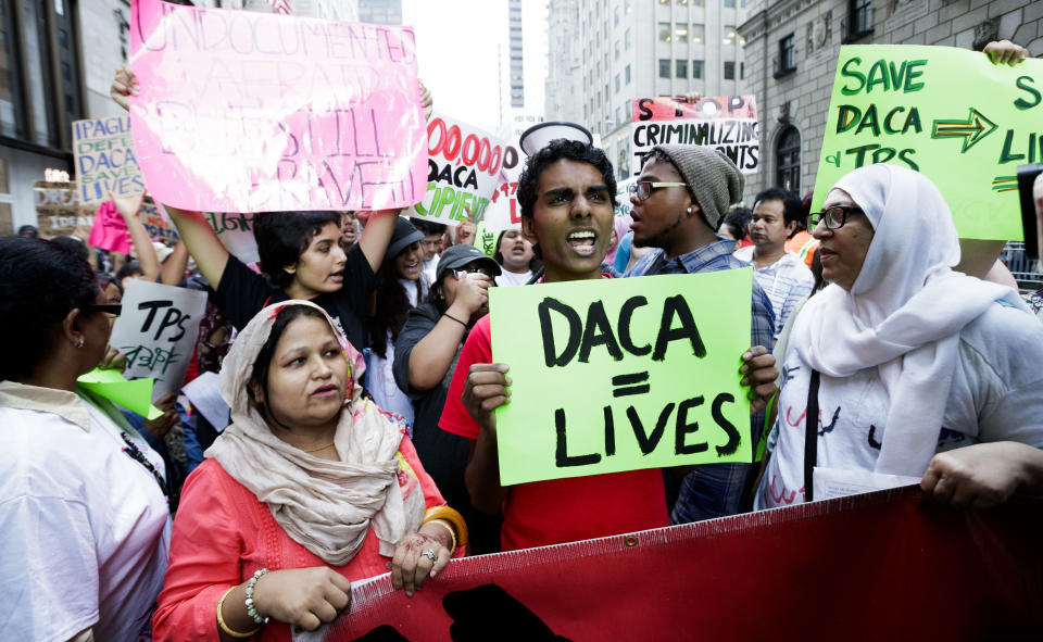 <p>People gather for a rally and protest to mark the fifth anniversary of the Deferred Action for Childhood Arrivals (DACA) program near Trump Tower in New York City, August 2017. (Photo: Justin Lane/EPA/REX/Shutterstock) </p>