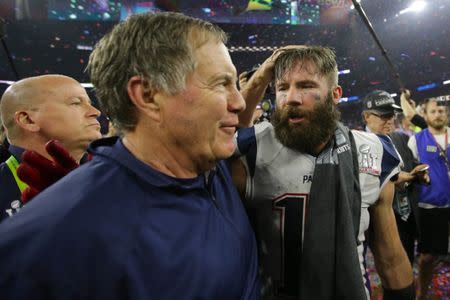 Feb 5, 2017; Houston, TX, USA; New England Patriots head coach Bill Belichick celebrates with wide receiver Julian Edelman (11) after defeating the Atlanta Falcons during Super Bowl LI at NRG Stadium. Dan Powers-USA TODAY Sports