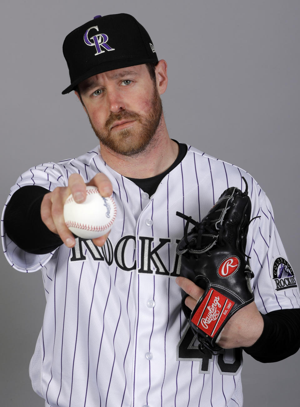 FILE - This is a 2020 photo of Scott Oberg of the Colorado Rockies baseball team. Oberg is steadily making his way back to the mound after sitting out last season due to blood clots in his pitching arm. it was the third time over his career the clots have surfaced. (AP Photo/Darron Cummings, File)