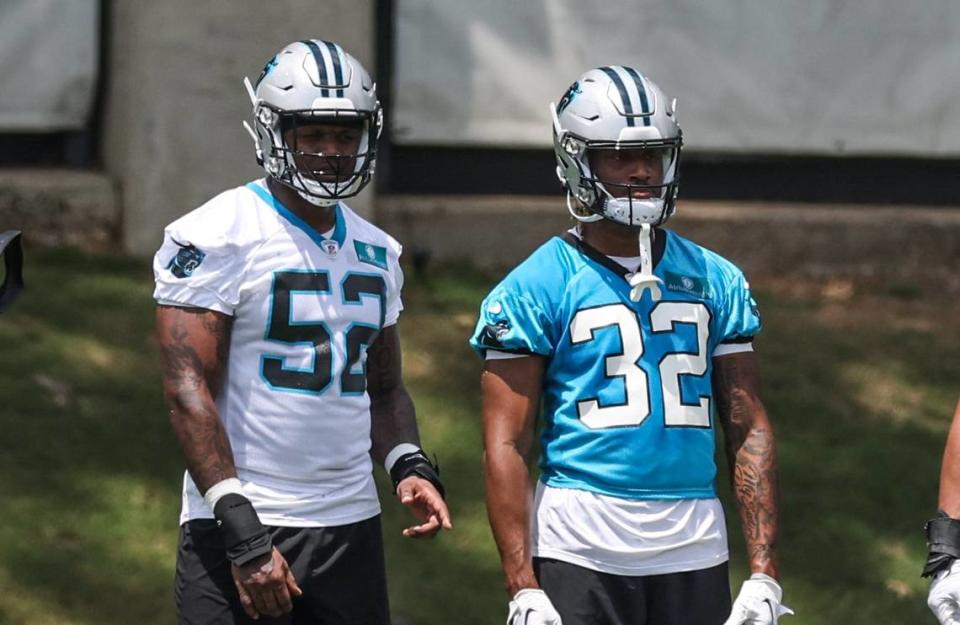 Carolina Panthers linebacker DJ Johnson, left and running back Camerun Peoples practice at the Carolina Panthers rookie minicamp in Charlotte, N.C., on Saturday, May 13, 2023.