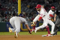 Houston Astros' Jake Meyers, left, steals second as Los Angeles Angels third baseman David Fletcher waits for a the ball that ended up going over his head during the fifth inning of a baseball game Thursday, Sept. 23, 2021, in Anaheim, Calif. (AP Photo/Mark J. Terrill)