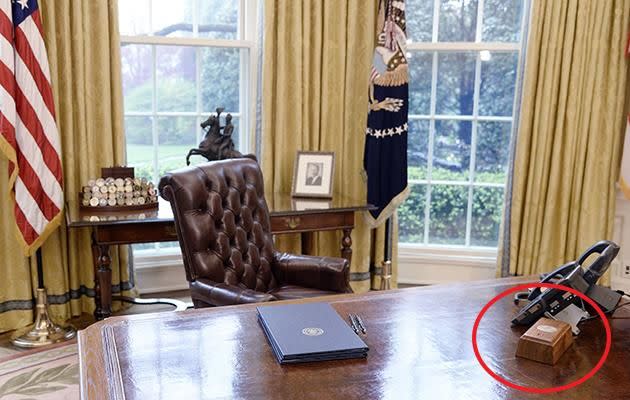 The President has a Coke ordering button on his Oval Office desk. Photo: Getty