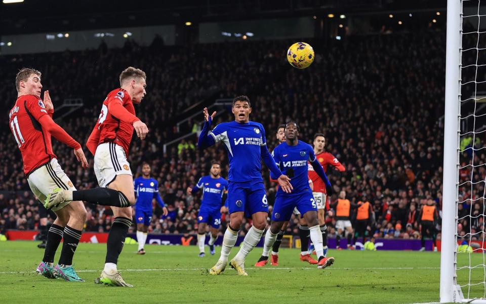 Scott McTominay of Manchester United headers in their 2nd goal against Chelsea