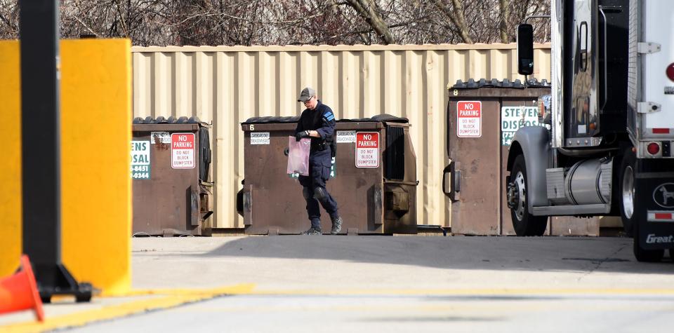 Michigan State Police bomb squad members took some type of device behind the dumpsters at the Pilot Travel Center, 1100 N. Dixie Highway. The bomb squad was called to the scene Thursday afternoon to check out a silver Ford Taurus at the truck stop after Monroe police found a suspicious device in the car. Business at the truck stop carried on as usual.