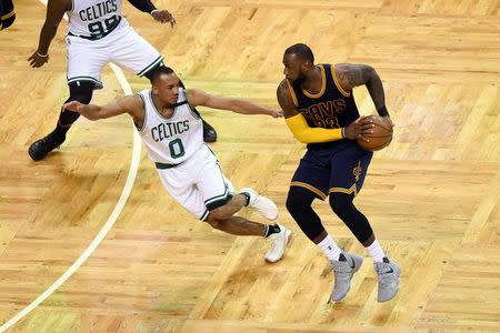 May 25, 2017; Boston, MA, USA; Cleveland Cavaliers forward LeBron James (23) looks to pass around Boston Celtics guard Avery Bradley (0) during the third quarter of game five of the Eastern conference finals of the NBA Playoffs at TD Garden. Mandatory Credit: Bob DeChiara-USA TODAY Sports