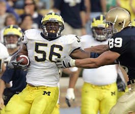 Michigan linebacker LaMarr Woodley was a unanimous first-team All-American.