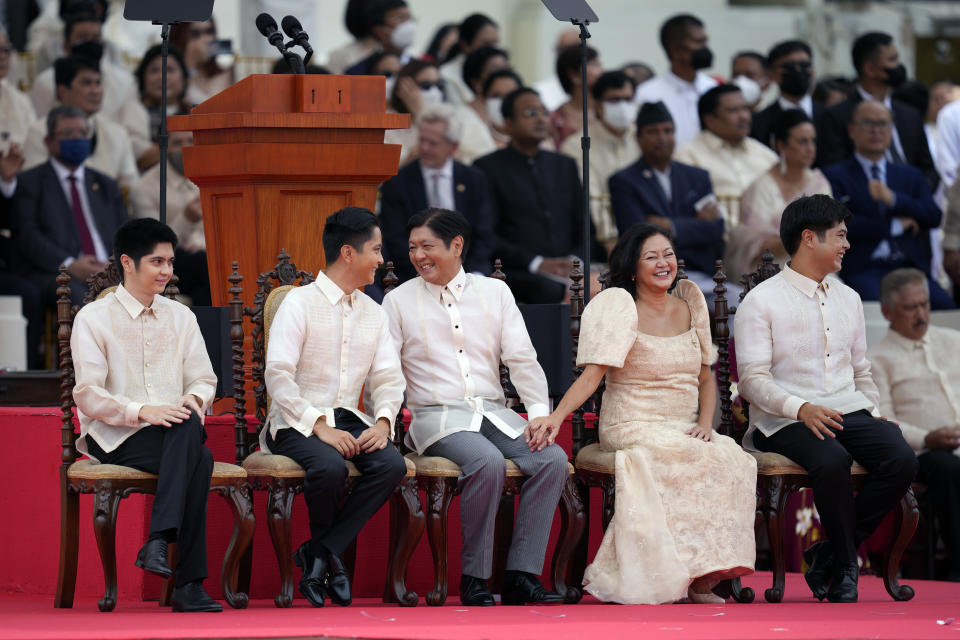 President-elect Ferdinand "Bongbong" Marcos Jr. and his family attend the inauguration ceremony at National Museum on Thursday, June 30, 2022 in Manila, Philippines. Marcos was sworn in as the country's 17th president. (AP Photo/Aaron Favila)