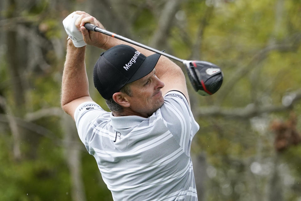 Justin Rose, of England, hits a shot from the third tee during the third round of the Arnold Palmer Invitational golf tournament Saturday, March 6, 2021, in Orlando, Fla. (AP Photo/John Raoux)