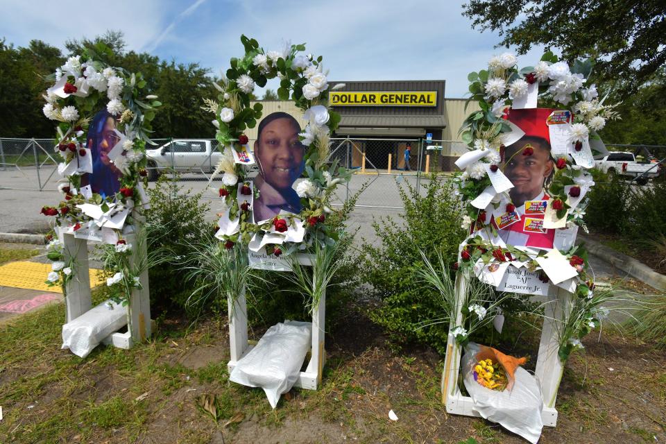 A makeshift memorial for Angela Carr, Anolt "AJ" Laguerre Jr., and Jerrald Gallion, who were killed in the Aug. 26 shooting at this Dollar General store in Jacksonville, has gone up in front of the Kings Road business that was later in the process of being gutted. A white gunman shot and killed the three Black victims, then took his own life and left behind manifestos declaring his hate for the race.