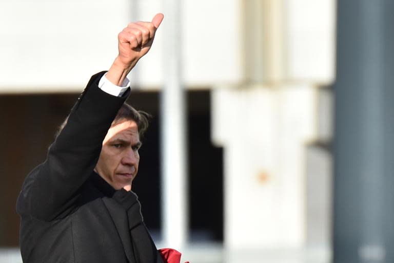 Roma's coach Rudi Garcia is playing down his side's hopes for the Italian League title, but has his eyes on second place