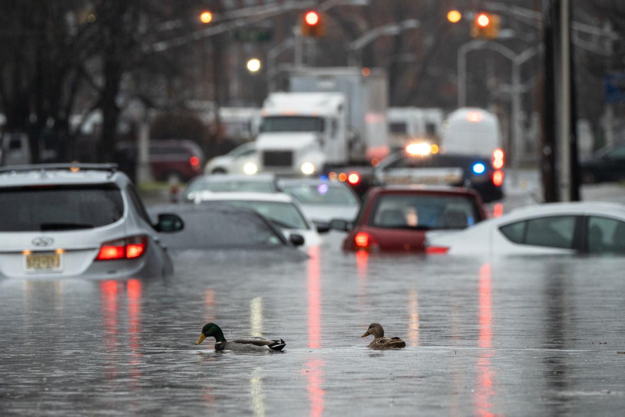 Cars were left stranded in flood waters on River St in Paterson, NJ on Monday Dec. 18, 2023.