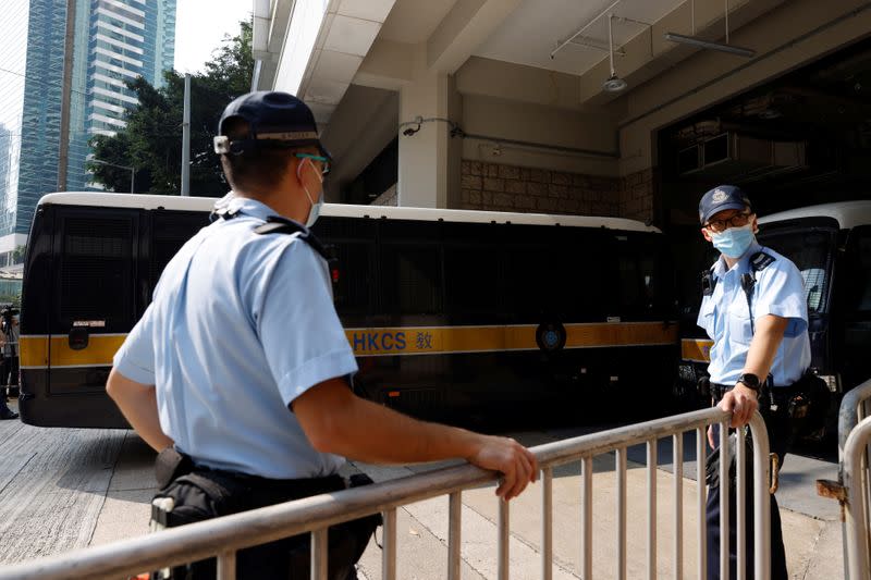 A prison van carrying Tong Ying-kit, the first person charged under the new national security law, arrives at High Court for a hearing, in Hong Kong