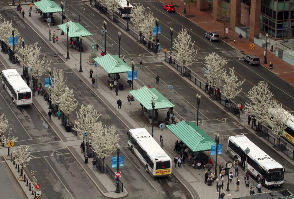 Published Caption:  Kennedy Plaza [The Providence Journal / Bob Breidenbach]

 Original Caption:  Thursday May 1, 2014 Providence, RI Providence Journal photo/Bob Breidenbach Photos at Kennedy Plaza bus stop to go with story about Senate Finance Committee hears presentation on the governor's state budget proposal to borrow $40 million to pay for transportation improvements.