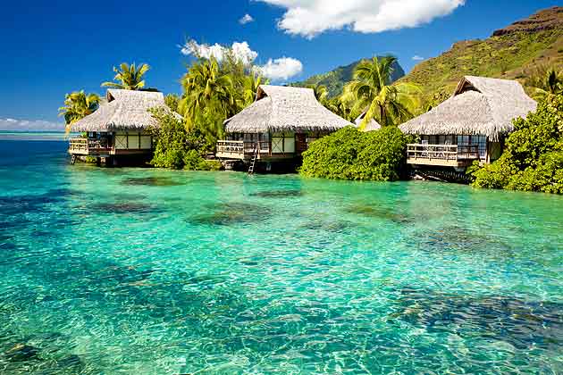 Bora Bora in Tahiti is surrounded by a picturesque lagoon and barrier reef. It is one of the charming islands of French Polynesia. 