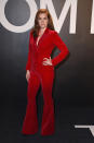 Amy Adams channels her American Hustle character in this red suit with flare pants, a modern take on ‘70s fashion.