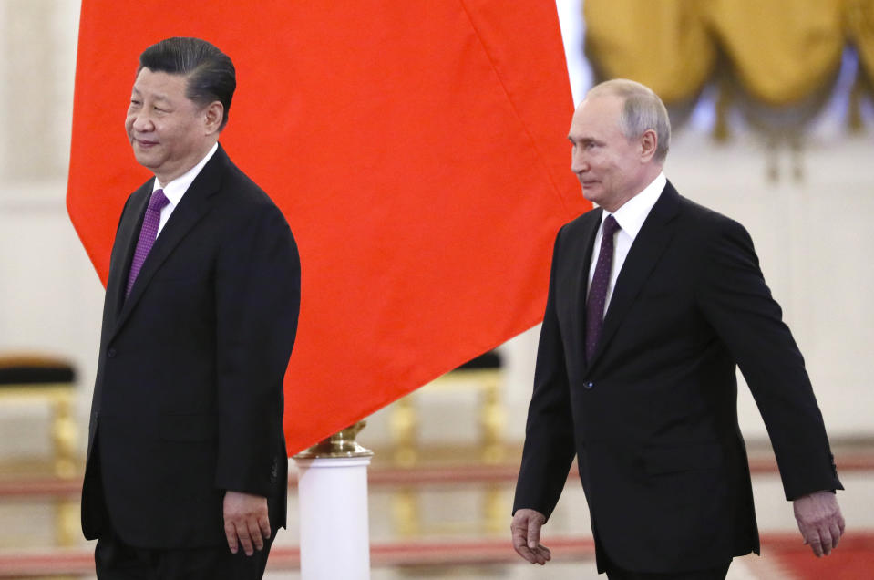 Russian President Vladimir Putin, right, meets with his Chinese counterpart Xi Jinping in Kremlin in Moscow, Russia, Wednesday, June 5, 2019. Chinese President Xi Jinping is on visit to Russia this week and is expected to attend Russia's main economic conference in St. Petersburg. (Evgenia Novozhenina/Pool Photo via AP)