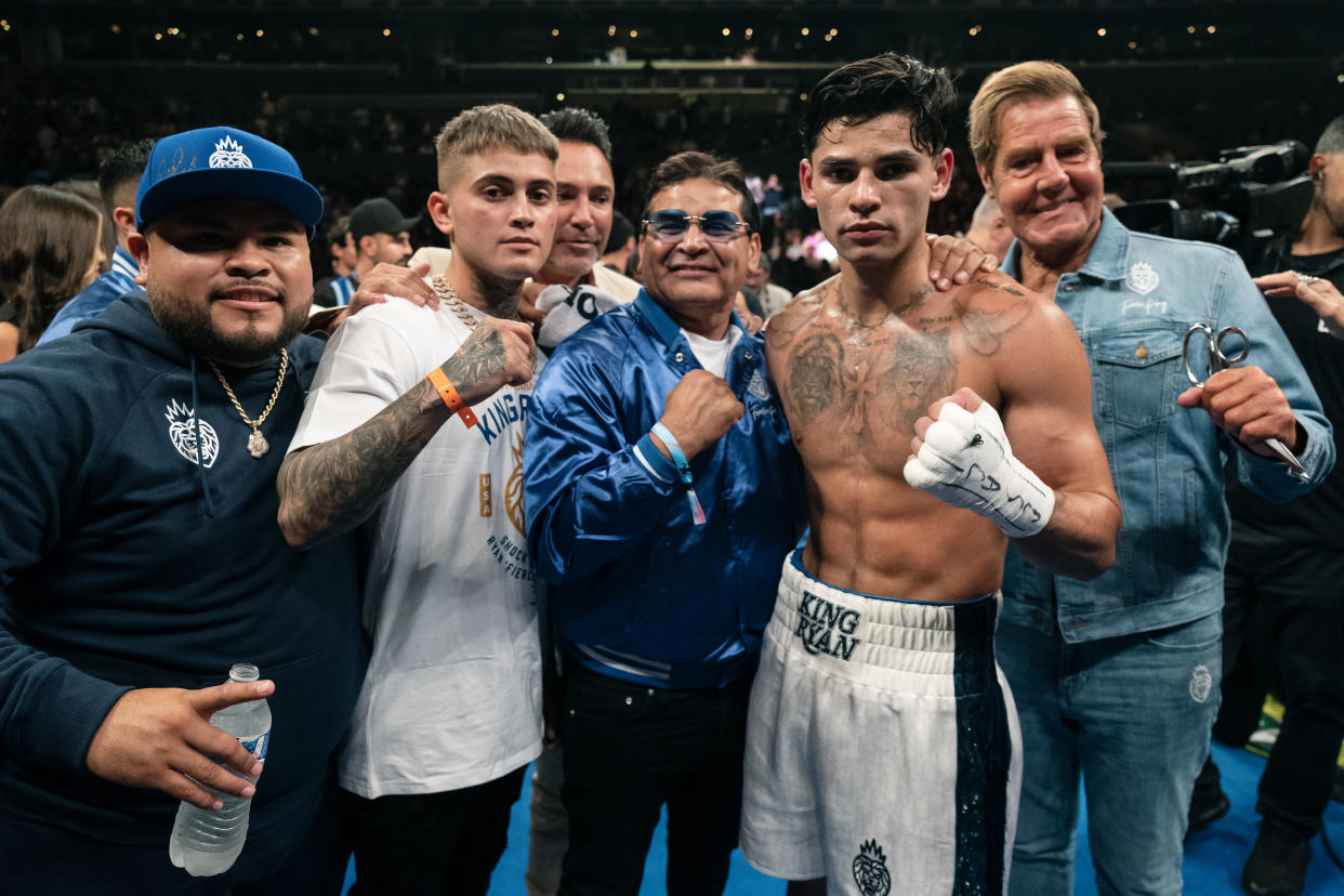 LOS ANGELES, CALIFORNIA - JULY 16: Ryan Garcia (second from the right) poses with his team after defeating Javier Fortuna during their Super Light weight 12 rounds fight at Crypto.com Arena on July 16, 2022 in Los Angeles, California (Photo by Sye Williams/Getty Images)