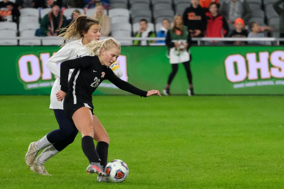 Waynesville forward Samantha Erbach (26) dribbles the ball during the OHSAA girls Division III state soccer championship against Ottawa-Glandorf at Lower.com Field in Columbus, Ohio, Friday, Nov. 12, 2021.