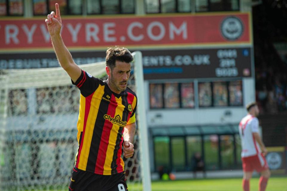 Brian Graham celebrates his goal <i>(Image: SNS)</i>