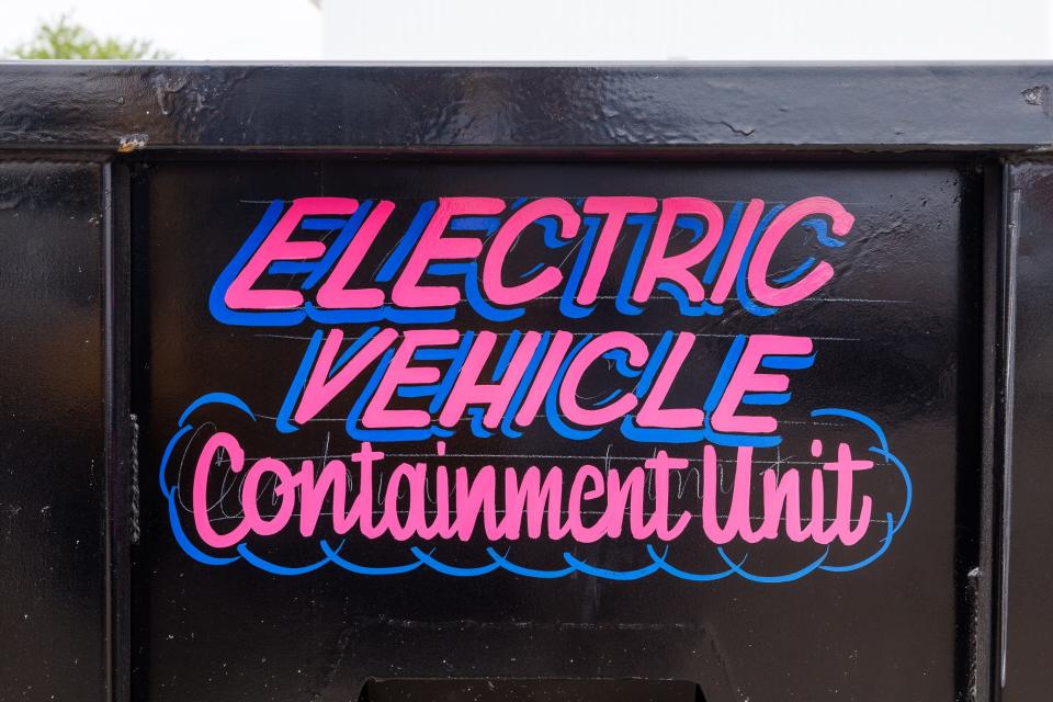 A containment unit for damaged electric vehicles is seen on the lot of Mike's Towing on York Street, Thursday, July 18, 2024, in Penn Township.