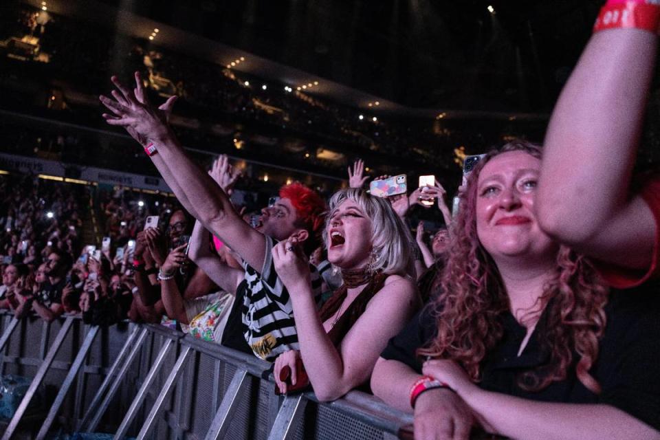 Fans cheer as Paramore performs at the Spectrum Center in Charlotte, N.C., on Tuesday, May 23, 2023.