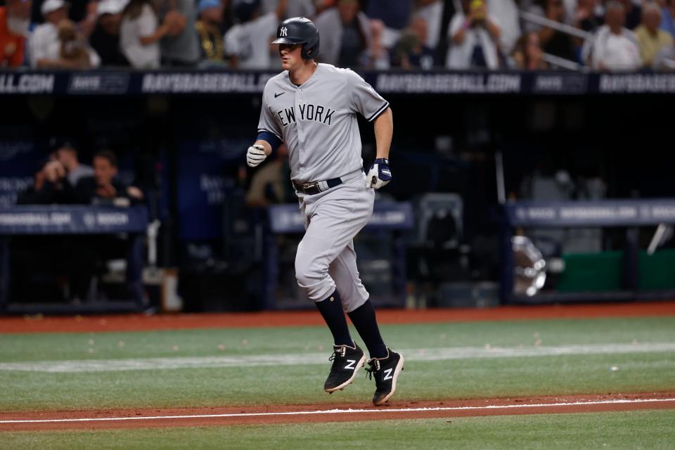 New York Yankees' DJ LeMahieu heads home to score on a home run against the Tampa Bay Rays during the eighth inning of a baseball game Friday, Aug. 25, 2023, in St. Petersburg, Fla. (AP Photo/Scott Audette)