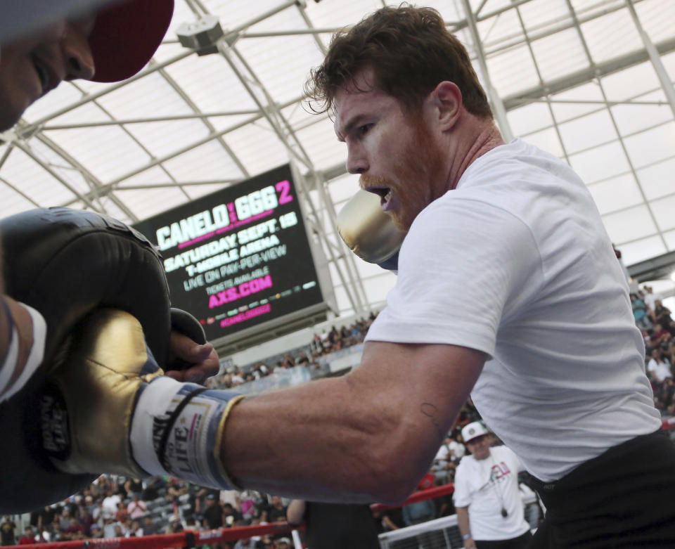 In this Sunday, Aug. 26, 2018 photo, middleweight Canelo Alvarez appears at a public workout at Banc of California Stadium in Los Angeles. (AP Photo)