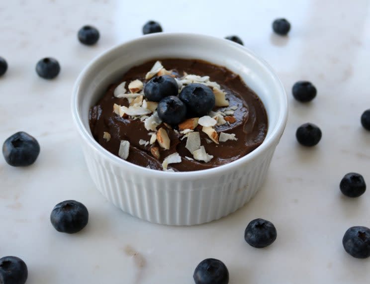 Top your mousse with blueberries, coconut flakes, and chopped almonds.