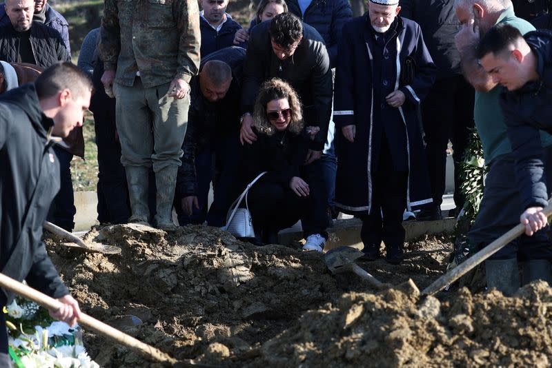 Family and friends take part in the funeral of Leonard Farruku, who died in December on the Bibby Stockholm accommodation barge in the United Kingdom