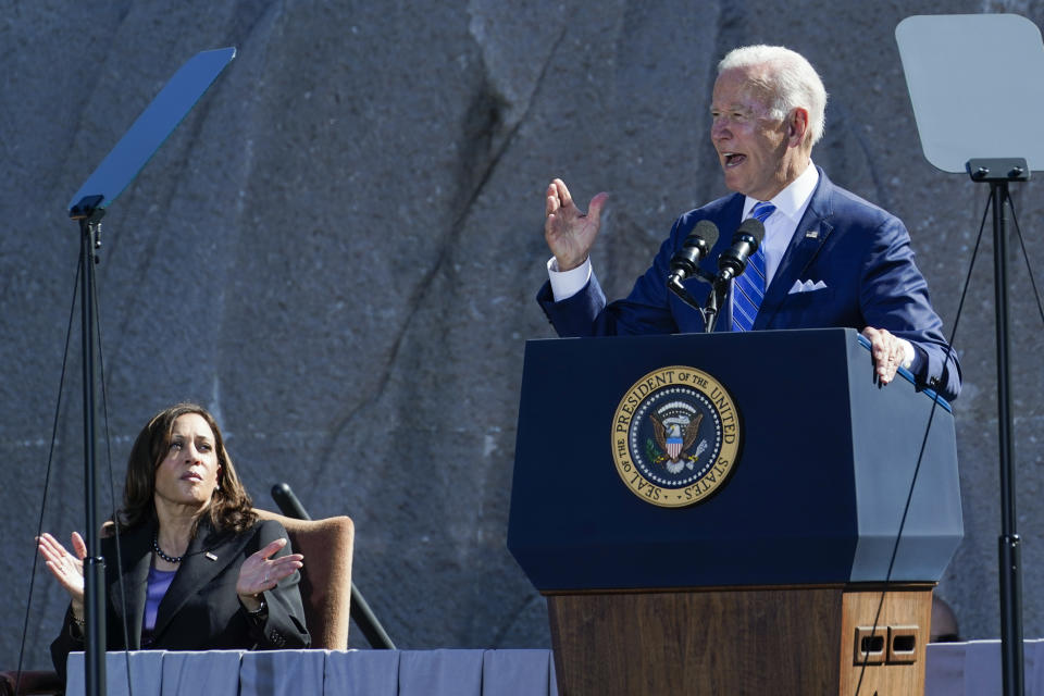 Vice President Kamala Harris applauds as President Joe Biden speaks during an event marking the 10th anniversary of the dedication of the Martin Luther King, Jr. Memorial in Washington, Thursday, Oct. 21, 2021. (AP Photo/Susan Walsh)