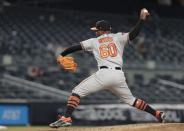 Mar 31, 2019; Bronx, NY, USA; Baltimore Orioles relief pitcher Mychal Givens (60) delivers a pitch during the seventh inning against the New York Yankees at Yankee Stadium. Mandatory Credit: Vincent Carchietta-USA TODAY Sports