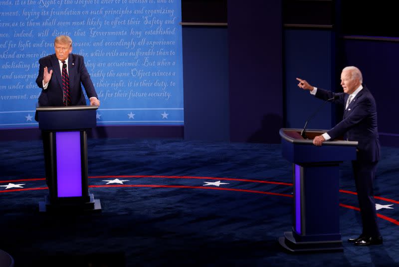 U.S. President Donald Trump and Democratic presidential nominee Joe Biden participate in their first 2020 presidential campaign debate in Cleveland