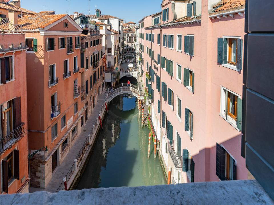 The penthouse overlooks the canals of Venice