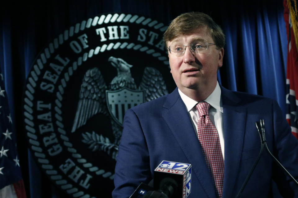 Republican Gov. Tate Reeves speaks with reporters about the state prison system, Thursday, Feb. 6, 2020, in Jackson, Miss. Reeves also gave an update on the search for a Mississippi Department of Corrections commissioner. (AP Photo/Rogelio V. Solis)