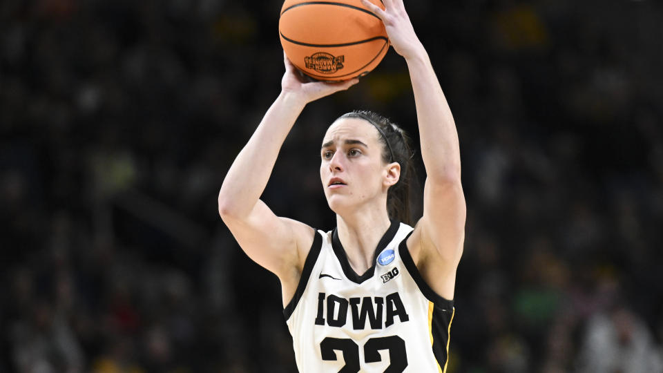 Iowa guard Caitlin Clark (22) shoots against Colorado during the first half of a Sweet Sixteen round college basketball game during the NCAA Tournament, Saturday, March 30, 2024, in Albany, N.Y. (AP Photo/Hans Pennink)