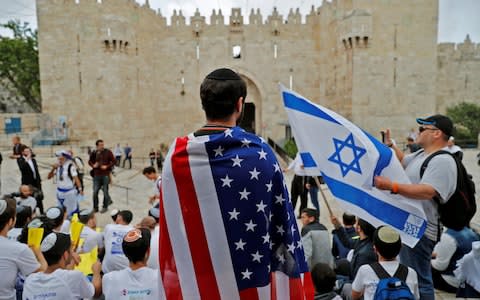 The US embassy opening has been welcomed by Israelis - Credit: AHMAD GHARABLI/AFP/Getty Images