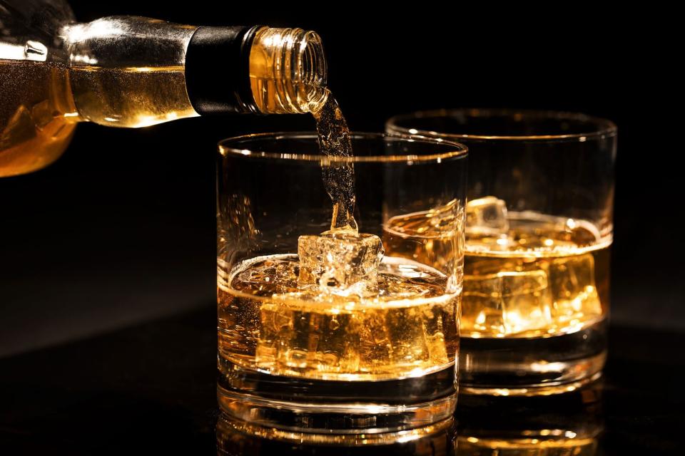 Scotch whisky pours into a glass