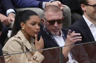 Boris Becker and partner Lilian de Carvalho Monteiro watch the men's final tennis match against at the Italian Open tennis tournament in Rome, Italy, Sunday, May 21, 2023. (AP Photo/Gregorio Borgia)