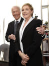 FILE - This March 26, 2015 file photo shows Christopher Plummer, left, and Julie Andrews, cast members in the classic film "The Sound of Music," at a 50th anniversary screening of the film at the opening night gala of the 2015 TCM Classic Film Festival in Los Angeles. Andrews released a memoir, “Home Work: A Memoir of My Hollywood Years,” which hits shelves on Oct. 15, 2019. (Photo by Chris Pizzello/Invision/AP, File)