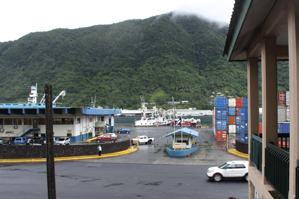 This Wednesday, March 4, 2020, photo shows the entrance to the Port of Pago Pago with main Port Administration building on the left and a U.S. based longline fishing fleet anchored at the main dock in Pago Pago, American Samoa. Mike Bloomberg spent more than $500 million to net one presidential primary win in the U.S. territory of American Samoa. His lone victory in the group of islands with a population of 55,000 was an unorthodox end to his much-hyped but short-lived campaign that ended Wednesday. (AP Photo/Fili Sagapolutele)