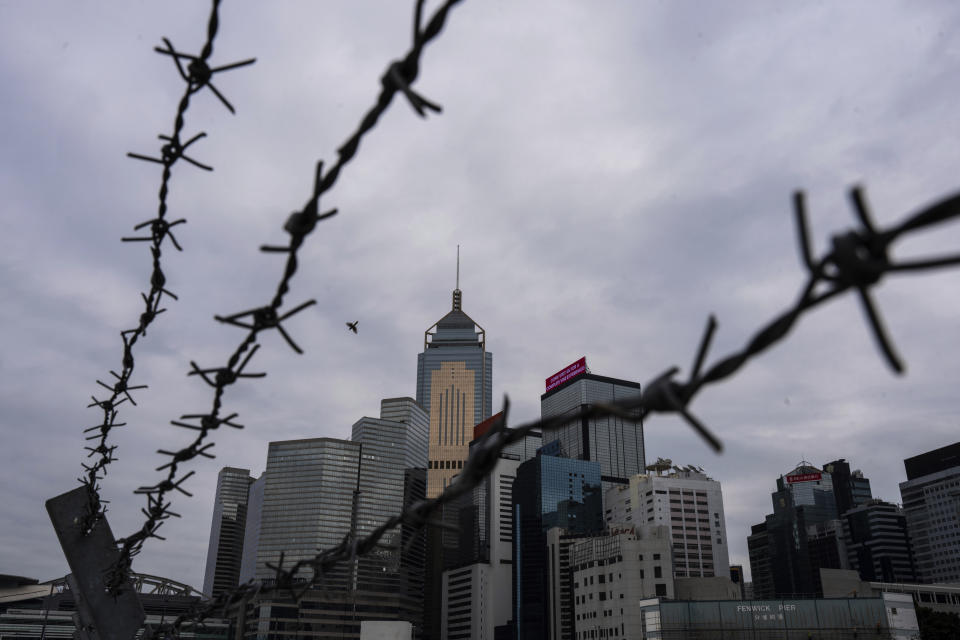 Cityscape is seen in Hong Kong, Tuesday, March 19, 2024. Hong Kong's lawmakers met in a special session to resume debate on a proposed national security law Tuesday, paving the way to grant the government more power to quash dissent in the southern Chinese city. (AP Photo/Louise Delmotte)