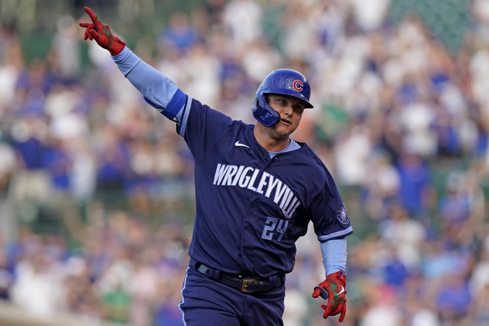 Chicago Cubs' Joc Pederson celebrates after hitting a solo home run during the first inning of the team's baseball game against the Miami Marlins in Chicago, Friday, June 18, 2021. (AP Photo/Nam Y. Huh)