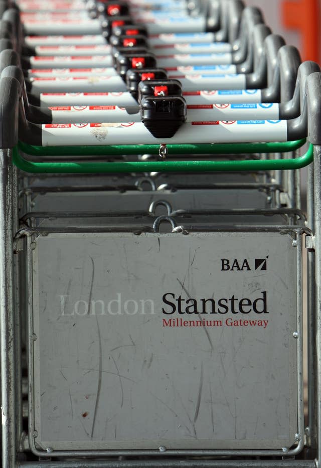 Luggage trolleys at Stansted Airport in Essex (Chris Radburn/AP)