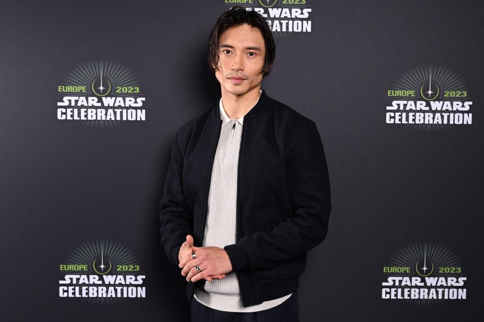 LONDON, ENGLAND - APRIL 07: Manny Jacinto attends the studio panel at Star Wars Celebration 2023 in London at ExCel on April 07, 2023 in London, England. (Photo by Jeff Spicer/Jeff Spicer/Getty Images for Disney)