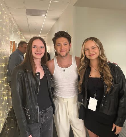 <p>Trace Adkins Instagram </p> Trace Adkins' daughters Trinity Adams and Mackenzie Adkins pose with Niall Horan.