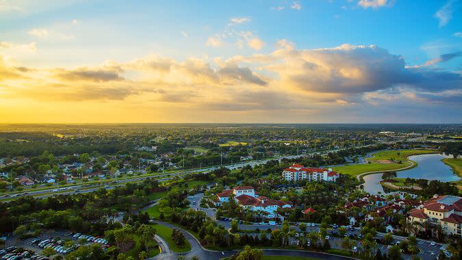 aerial sunset overlooking Orland Florida metropolitan area