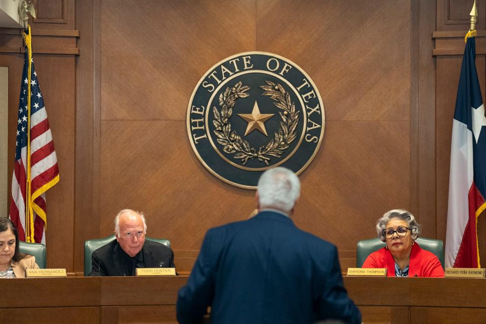 Rep. Todd Hunter, R-Corpus Christi, and Rep. Senfronia Thompson, D-Houston, listen to Liberty County Judge Jay Knight during the House State affairs committee as they meet to discuss the Colony Ridge development at the Texas Capitol Thursday, Oct. 19, 2023.