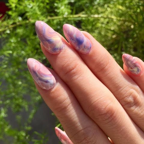 <p>We think 'out of this world' is the best way to describe this galactic manicure. Plus, you can keep wearing these soft-hued swirls well into spring.</p><p><strong>RELATED:</strong> <a href="https://www.goodhousekeeping.com/beauty/nails/how-to/g2916/marble-nails-step-by-step/" rel="nofollow noopener" target="_blank" data-ylk="slk:How to Get Marble Nails in 3 Easy Steps;elm:context_link;itc:0;sec:content-canvas" class="link ">How to Get Marble Nails in 3 Easy Steps</a></p><p><a href="https://www.instagram.com/p/B7l_DnKAvNo/&hidecaption=true" rel="nofollow noopener" target="_blank" data-ylk="slk:See the original post on Instagram;elm:context_link;itc:0;sec:content-canvas" class="link ">See the original post on Instagram</a></p>