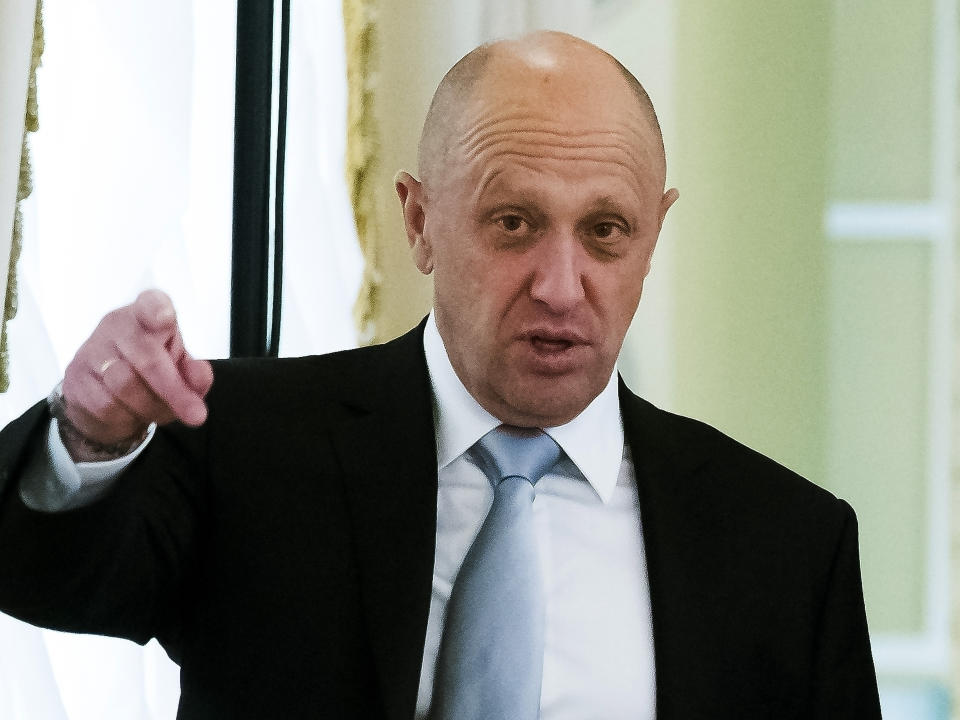 FILE - businessman Yevgeny Prigozhin gestures on the sidelines of a summit meeting between Russian President Vladimir Putin and Turkish President Recep Tayyip Erdogan at the Konstantin palace outside St. Petersburg, Russia, on Tuesday, Aug. 9, 2016. Prigozhin, an entrepreneur known as "Putin's chef" because of his catering contracts with the Kremlin, has admitted he interfered in U.S. elections and says he will continue to do so — for the first time confirming the accusations he has been rejecting for years. "We have interfered, are interfering and will continue to interfere. (AP Photo/Alexander Zemlianichenko, File)