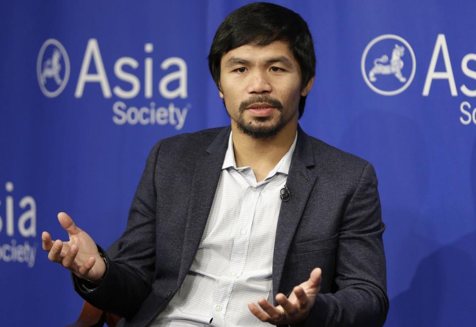 Boxer Manny Pacquiao takes questions at the Asia Society in New York in October 2015. The boxing star, who was campaigning for a Senate seat in his native Philippines, caused a firestorm after saying people in same-sex relationships "are worse than animals."